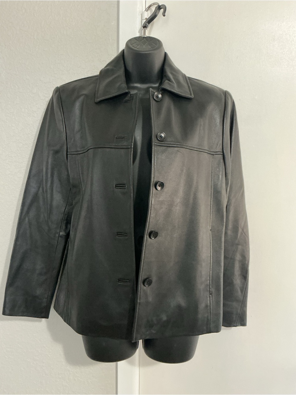 Womenโs black leather jacket. Size small